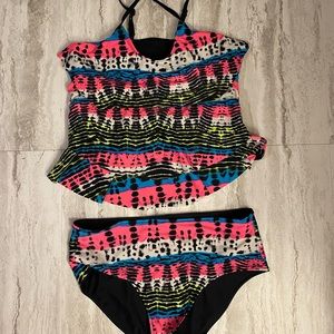 Justice two peice girls swim suit. Size 18 plus